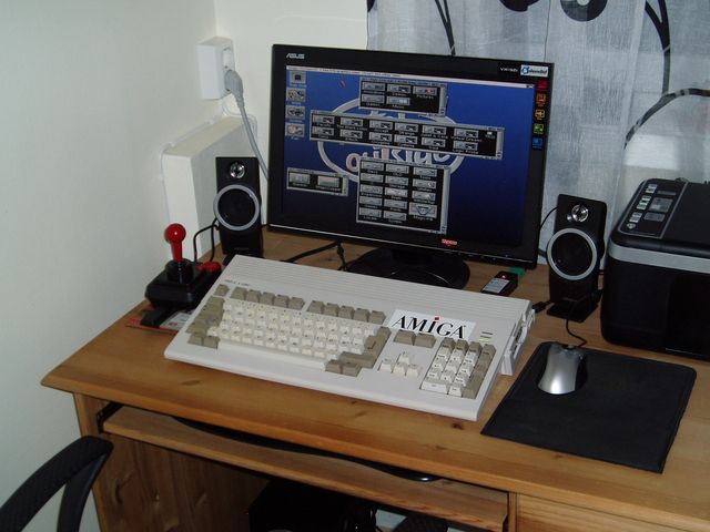 My Amiga 1200.

The specifications are as follows:

ESCOM Amiga 1200
Apollo 68030-40mHz with 16MB Fast-RAM
IndivisionAGA
40GB 2.5 IDE HD
Easynet Wireless PCMCIA (ADSL)
Mikromys Mouse Adapter

Running MagicWB in 16 colours with Magic Copper installed. Resolution is 640 x 512.